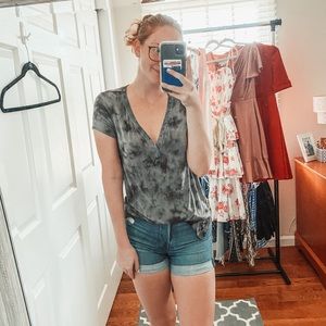 SUPER TRENDY BUTTON UP AND OPEN BACK TOP